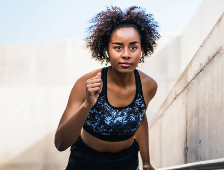 A black woman jogging via Shutterstock