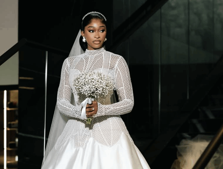 Bride in a custom Yemi Shoyemi bridal piece