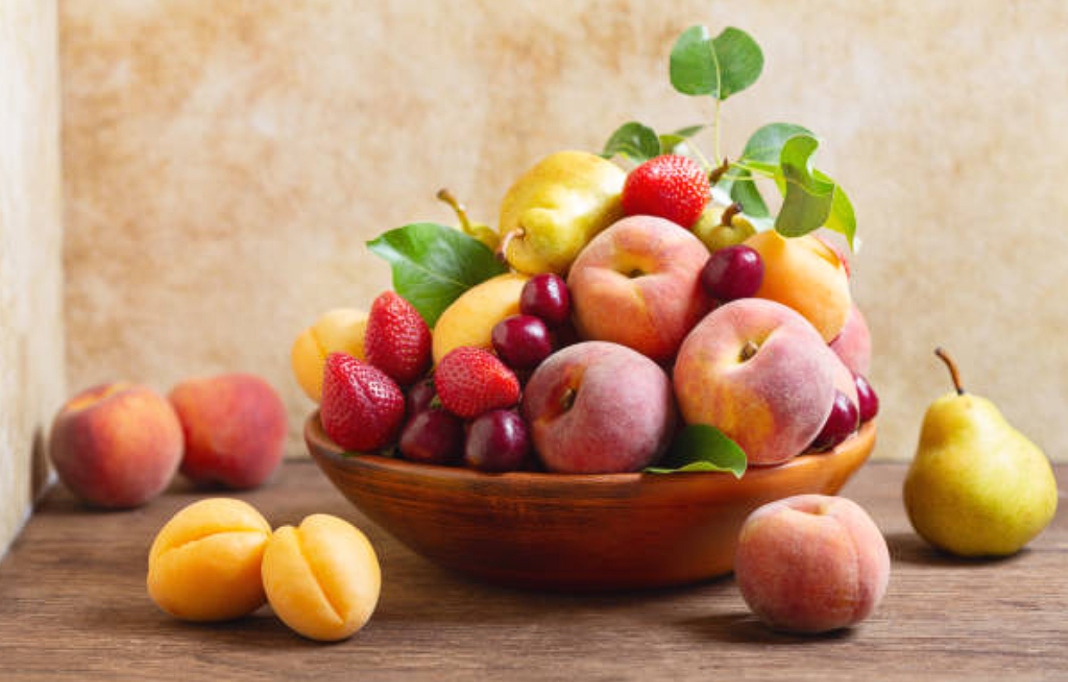 Why Does Eating Fruit Sometimes Make You Feel Tired? bowl of fruits