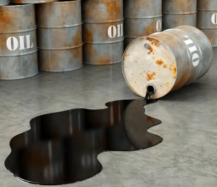 oil barrels spilling on the ground image