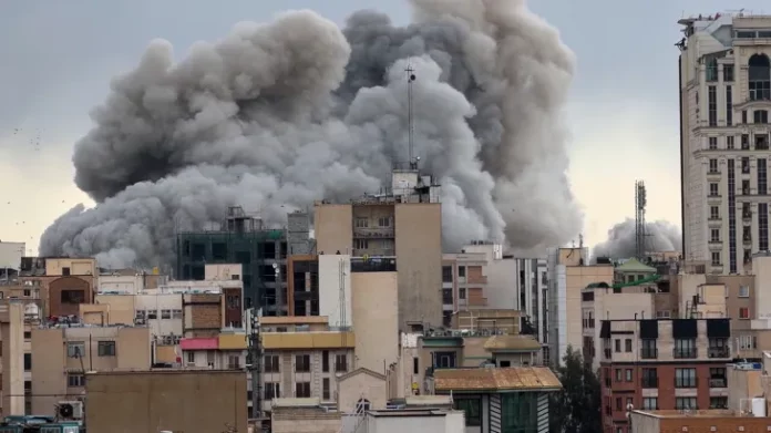 smoke coming out of bombed buildings