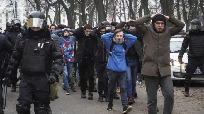 human rights activists escorted by police