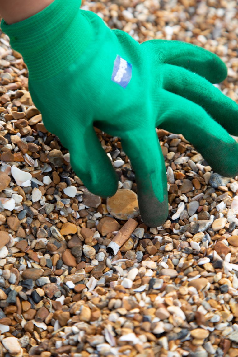 cigarette butt pick up at Great British Beach Clean at Hove Beach Brighton Billy Barraclough