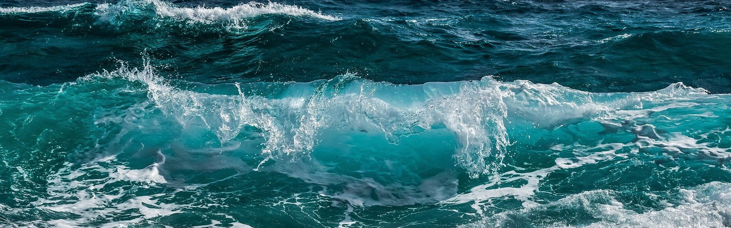 Ocean waves breaking on beach