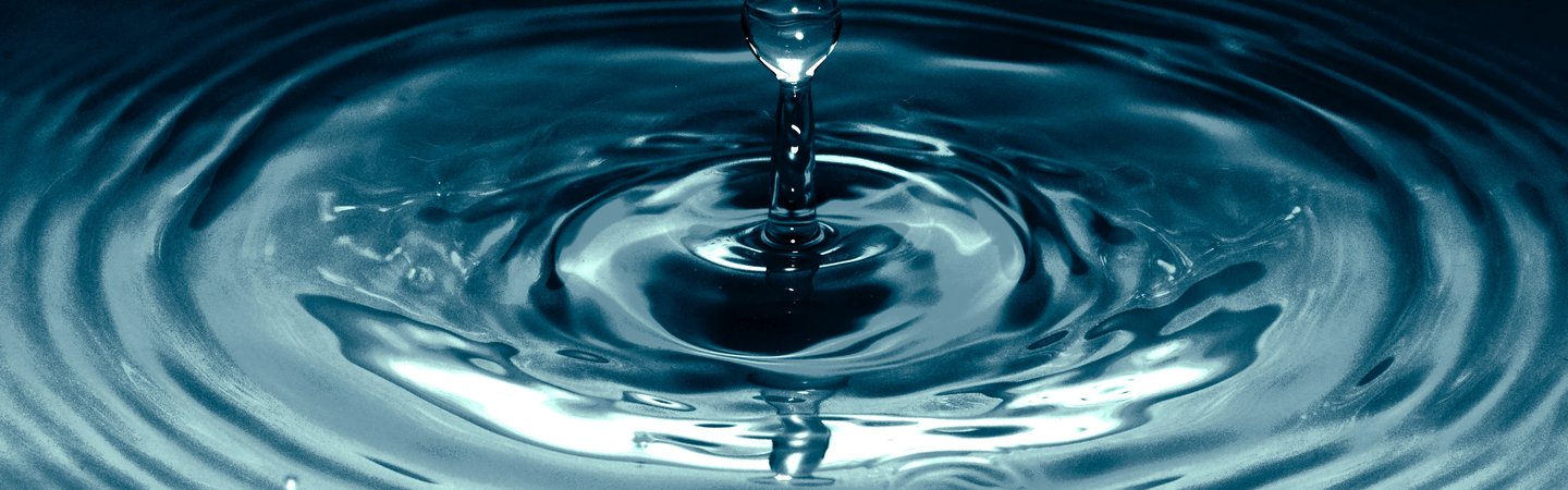 Water droplet in clear water