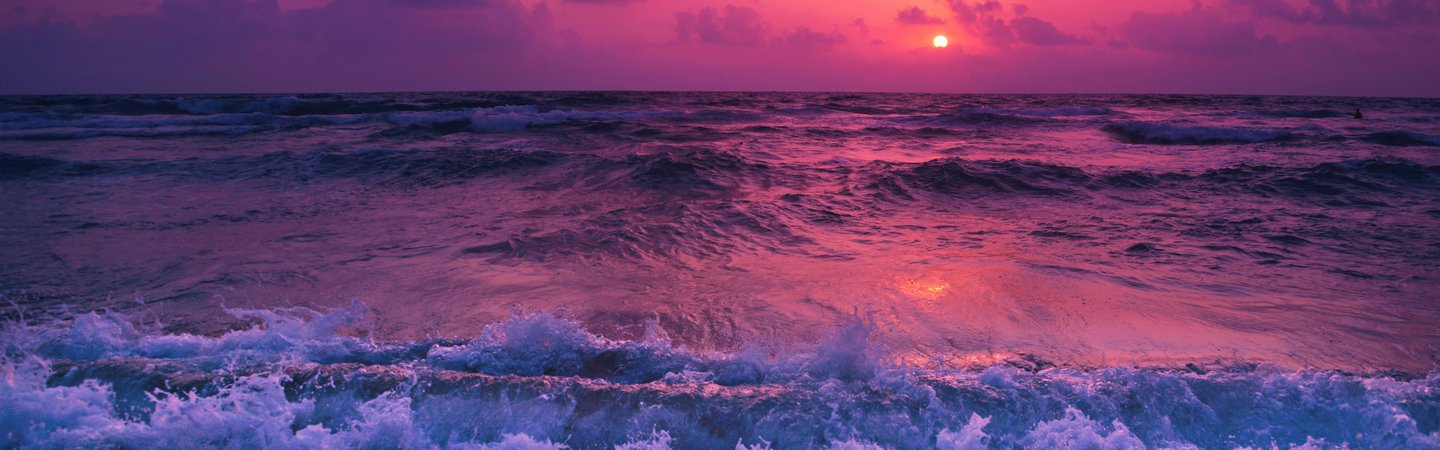 Sunset over beach - pink sky