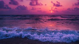 Sunset over beach - pink sky