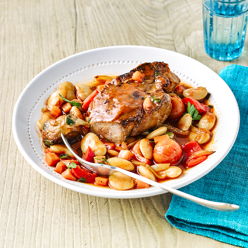 Spanish pork shoulder steaks with beans