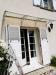 photo-0-Replacer un auvent de porte fenêtre au rez de chassée