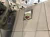 photo-0-Retirer une plaque de faïence d'un faux mur pour libérer l'accès à un compteur d'eau