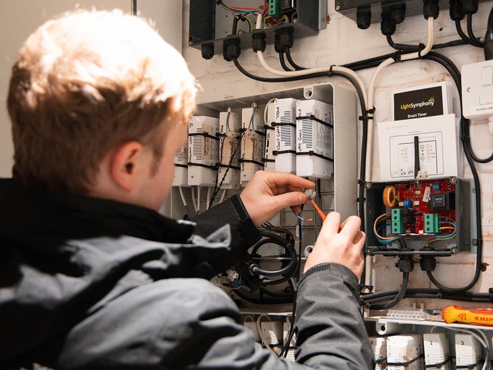Smart control system managing Hunza exterior lighting — integrated by Moonlight Design