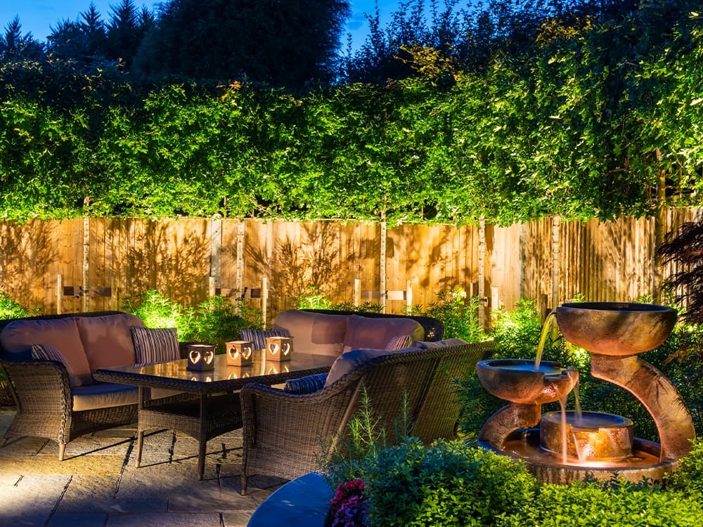 Moonlight Design completed garden lighting project — Hunza outdoor fittings at night
