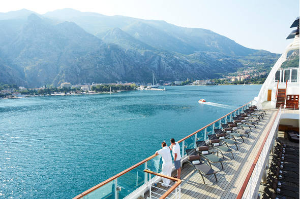 Couple on a Seabourn cruise through the fjords