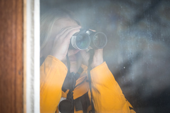 Using binoculars on a Quark Expeditions cruise