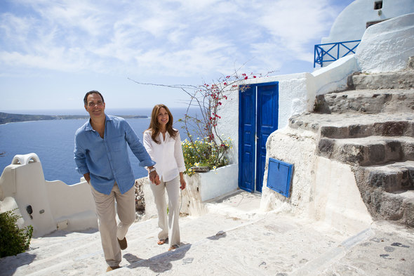 Couple on a shore excursion in Santorini, Greece