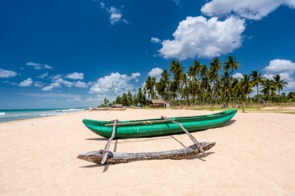 Fishing boat on Nilaveli beach near Trincomalee, Sri Lanka