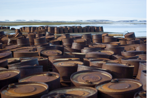 Rusty barrels on Graham Bell Island, Franz Josef Land, Russia