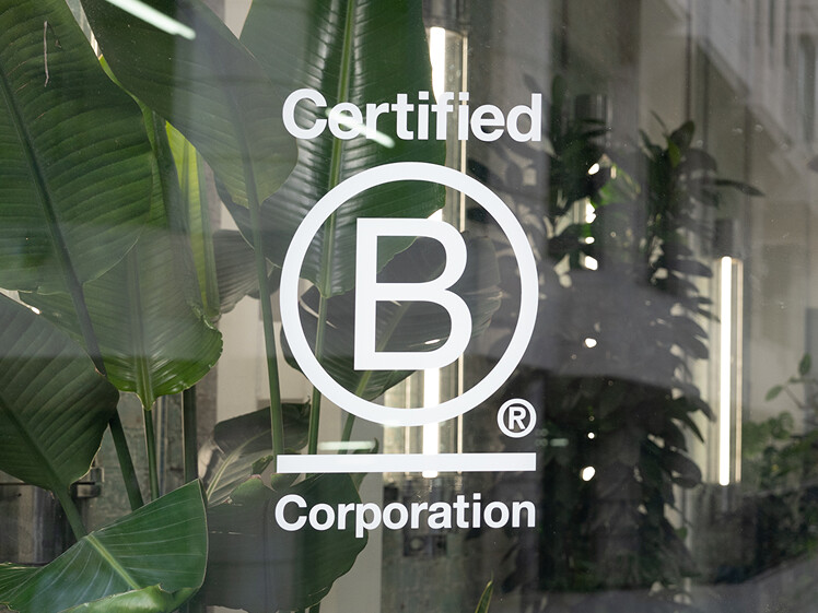 The B-Corp certification badge printed proudly on our front of house.