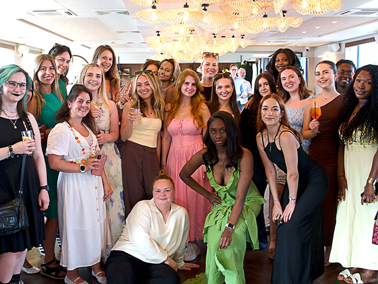 Group photo of our staff members and staff from community charity partner we support.