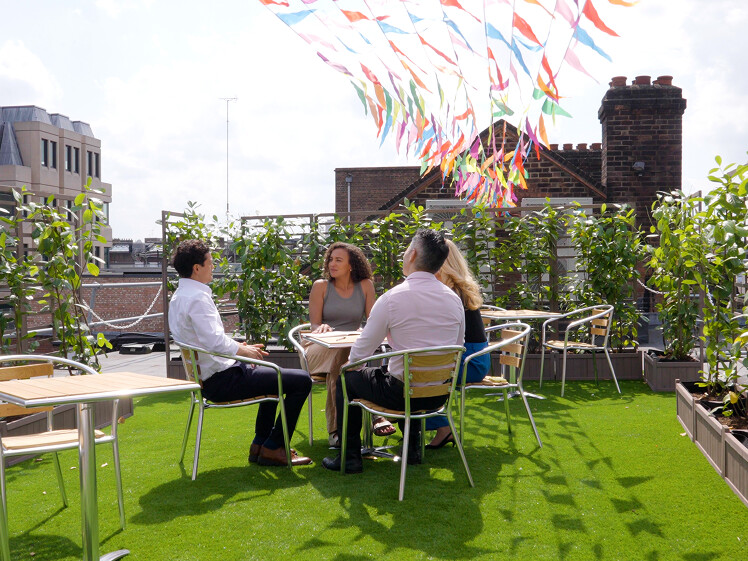 1st Formations staff members at summer party on our rooftop terrace.