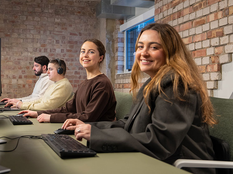 Front of the building of our office showing our B-Corp certification logo.