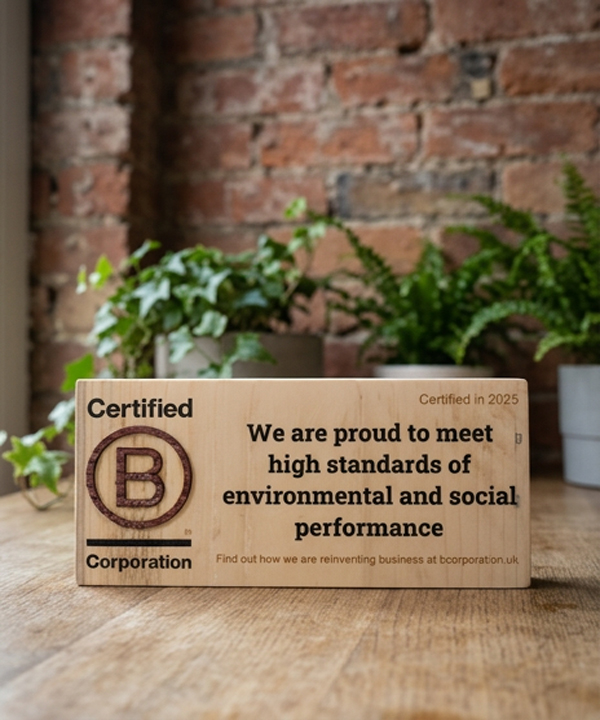 Our Certified B Corporation plaque on a desk in the office.