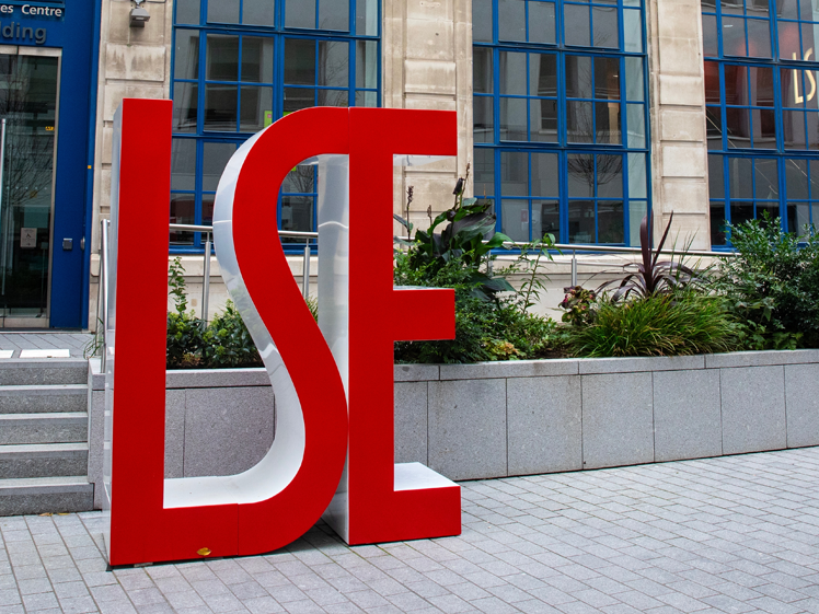 Outdoor signare of the LSE GenDen in London.