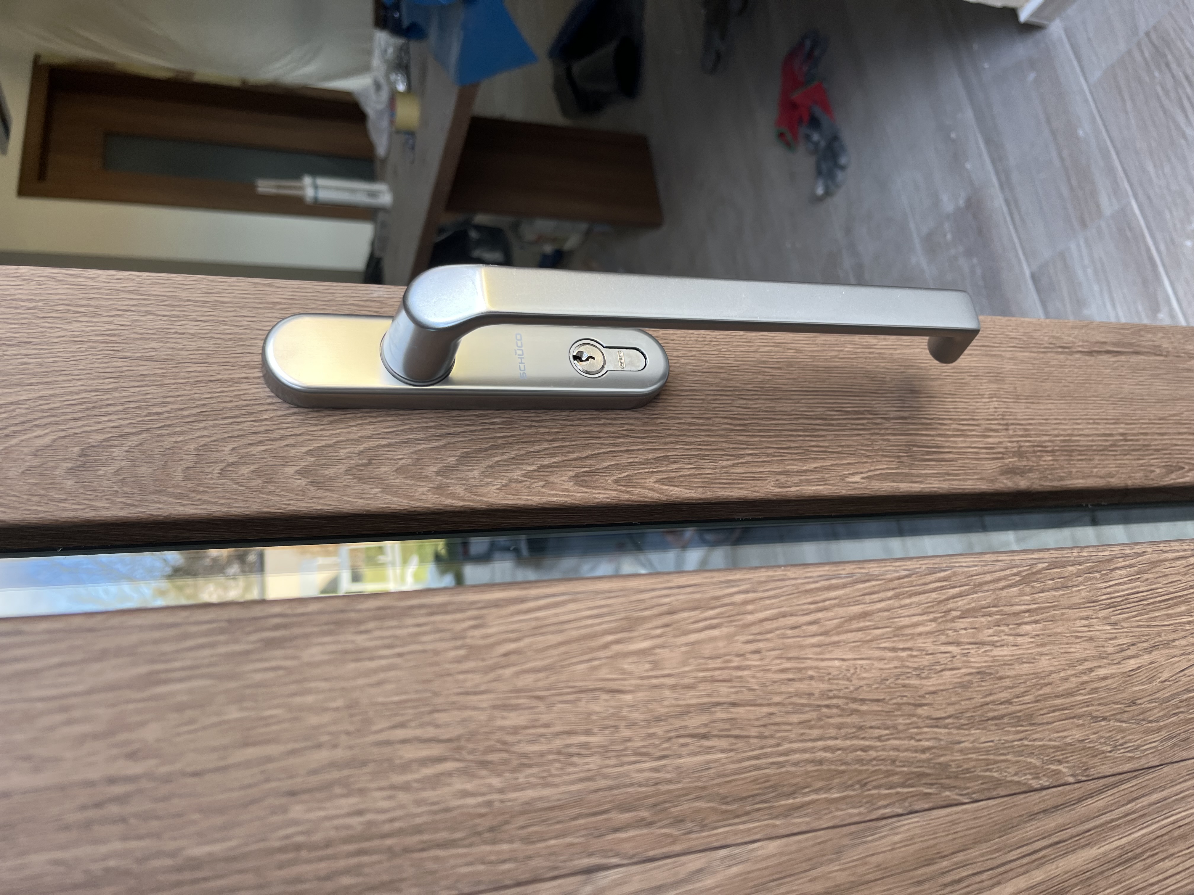 Oboustranná klika nerez Schüco