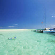 Snorkelling alongside sailing boat, Fiji