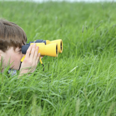 toddler with binoculars
