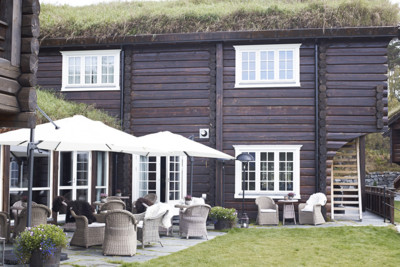 View of the exterior of the Storfjord Hotel in Norway