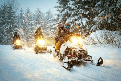 family adventure snowmobile