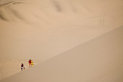 Sandboarding in the Paracas Desert