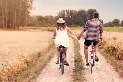 couple on bikes sabbatical planning