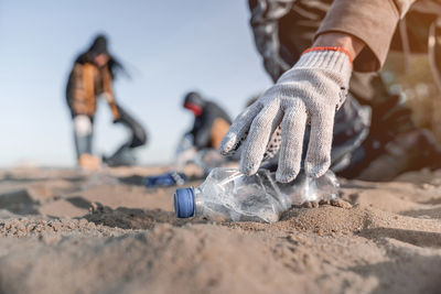 picking up plastics