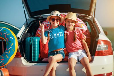girls car summer holiday
