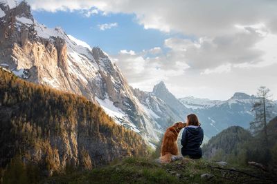dog and owner on a mountain