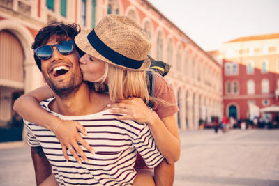 A couple kissing in Italy