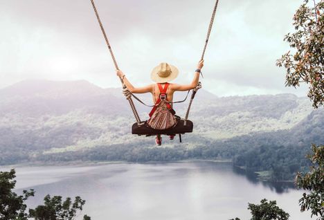 woman on a scenic swing