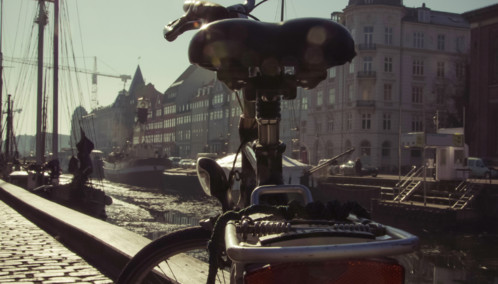 Bicycle overlooking Nyhaven under the sun