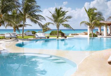 The pool at Viceroy Riviera Maya, luxury hotel in Mexico