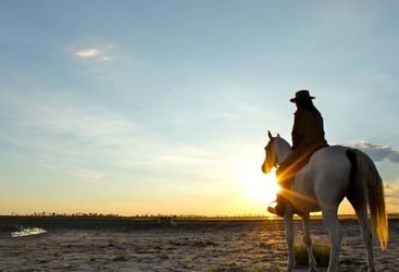 Horseback riding at Camp Kalahari, luxury camp in Botswana, Africa