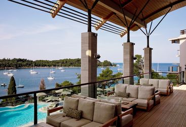 The terrace with ocean and pool views at Monte Mulini, luxury hotel in Croatia