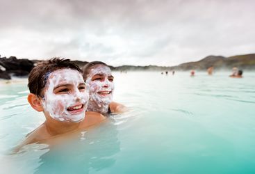 Children enjoying the Blue Lagoon, Iceland