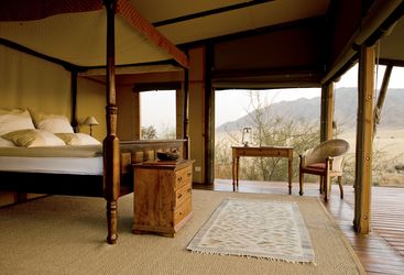 Double bedroom at Wolwedans Private Camp, luxury camp in Namibia