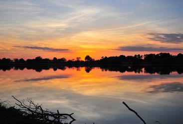 Reflections in the Zambezi River at sunset