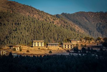 Gangtey Lodge exterior and mountain view