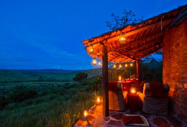 Tarrace view by sunset at Klein's Camp, luxury camp in Tanzania