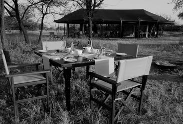 Outside dining at Olakira Camp, luxury camp in Tanzania