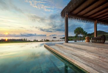 Sunset at Six Senses Fiji pool